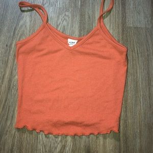 2 crop tops, come in green and pink.